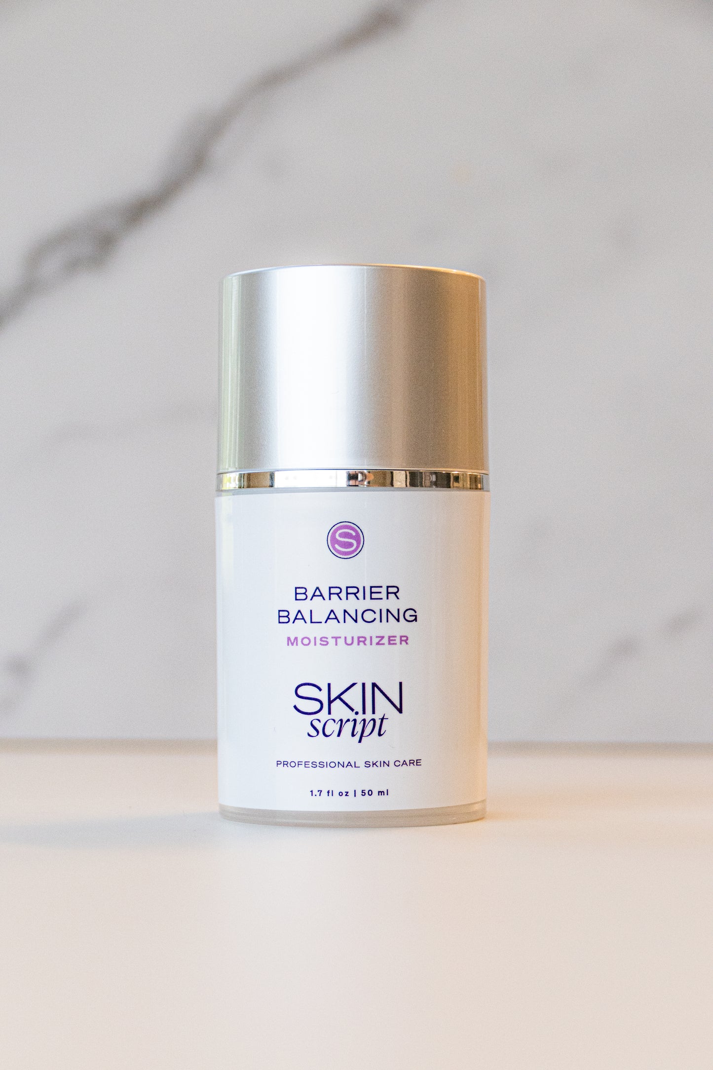 Skincare product labeled Barrier Balancing Moisturizer by Skin Script on a neutral background