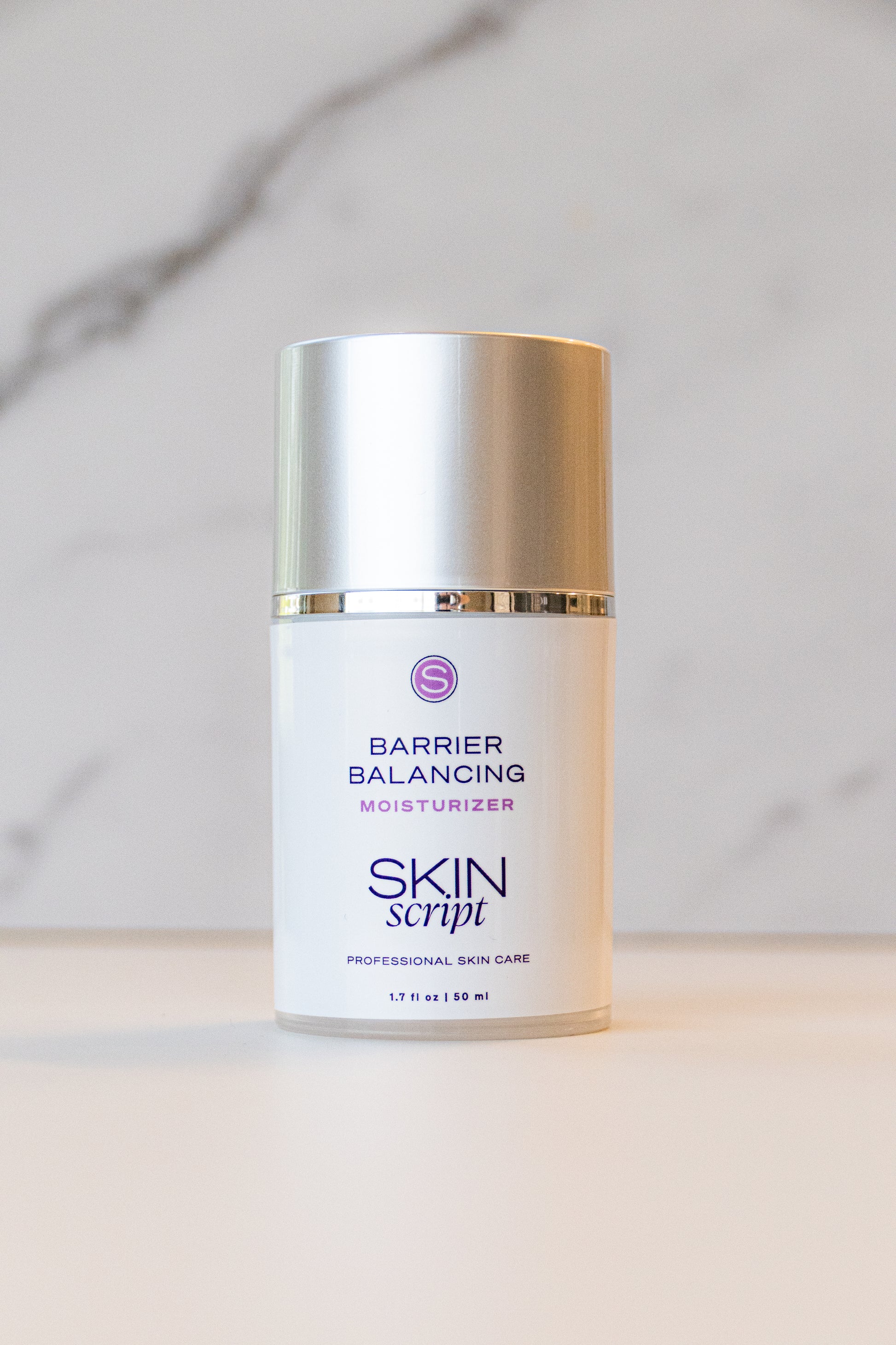 Skincare product labeled Barrier Balancing Moisturizer by Skin Script on a neutral background