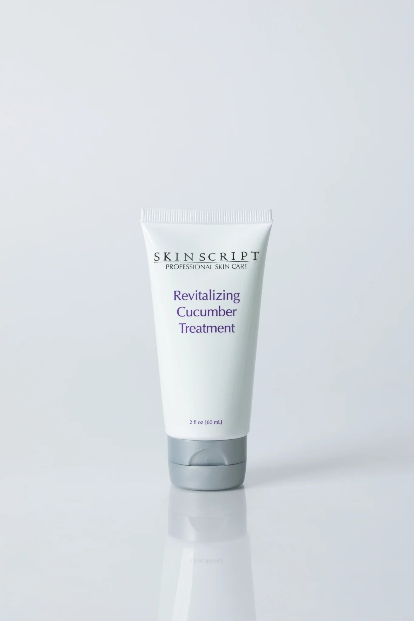 Skincare treatment tube labeled 'Revitalizing Cucumber Treatment' by Skin script on a white background