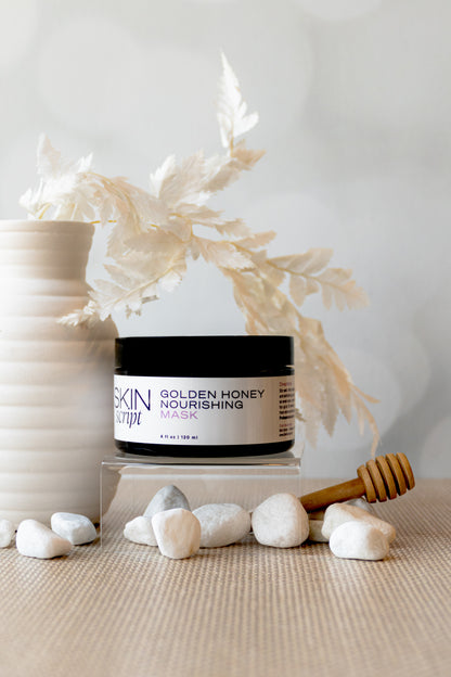 Skin Script Jar of Golden Honey Nourishing Mask with decorative elements on a neutral background